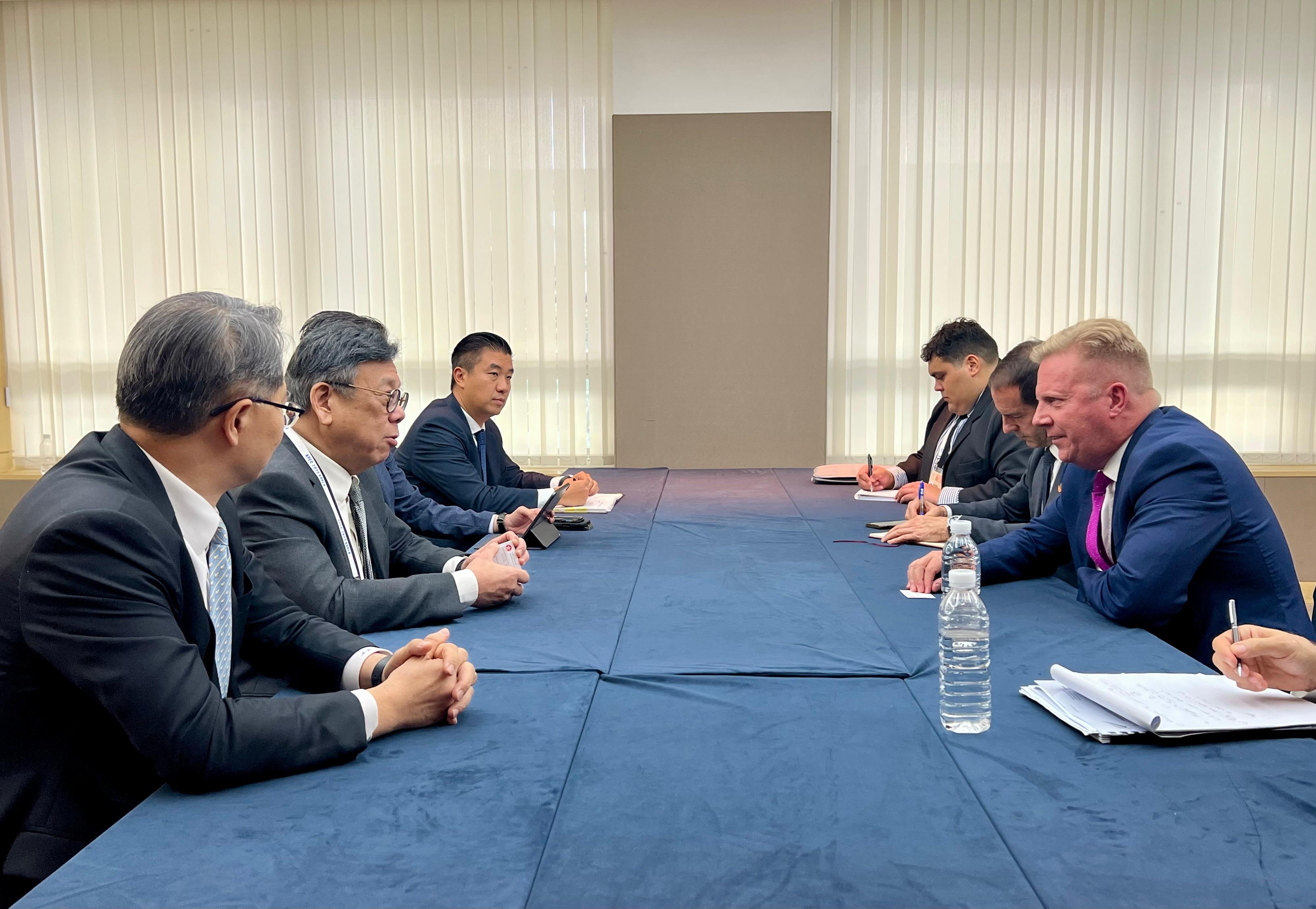 The Secretary for Commerce and Economic Development, Mr Algernon Yau (second left), meets with the Minister for Trade and Investment of New Zealand, Mr Todd McClay (first right), to exchange views on various issues of mutual concern on the sidelines of the Asia-Pacific Economic Cooperation Ministers Responsible for Trade Meeting in Jeju, Korea, today (May 15). The Director-General of Trade and Industry, Mr Aaron Liu (first left), also attended the meeting.