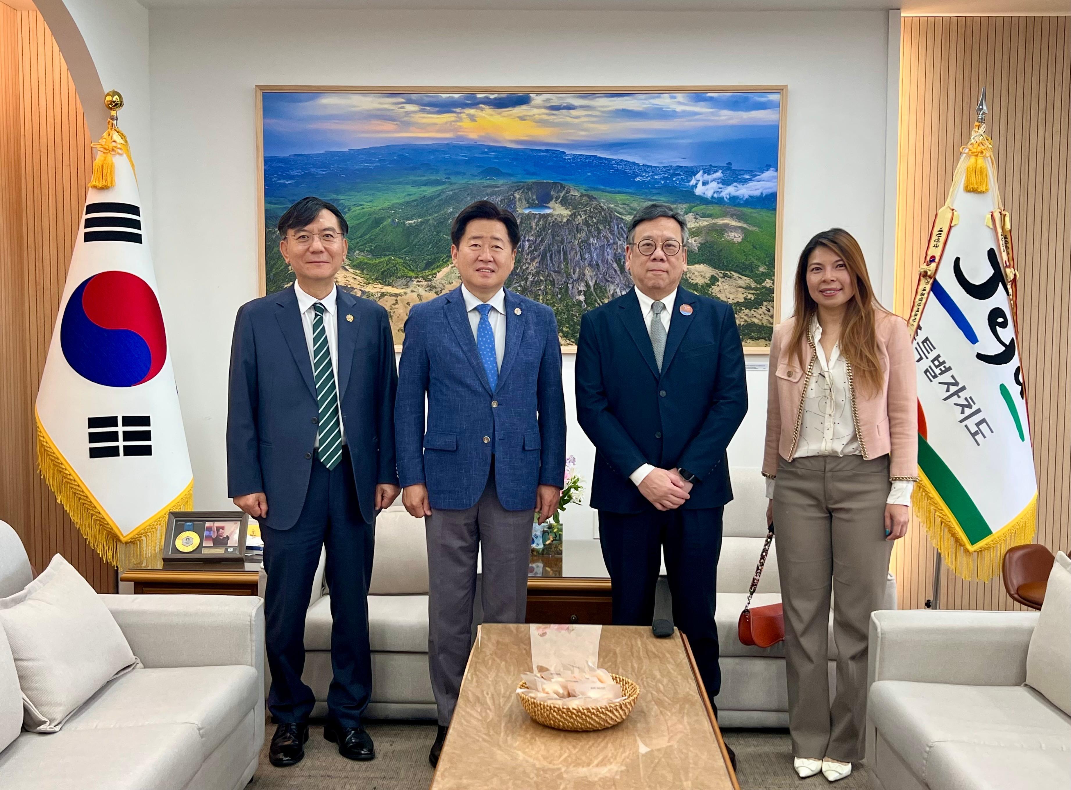 he Secretary for Commerce and Economic Development, Mr Algernon Yau, attended the Asia-Pacific Economic Cooperation Ministers Responsible for Trade Meeting in Jeju, Korea, today (May 15). Photo shows Mr Yau (second right) paying a courtesy call on the Governor of Jeju Special Self-Governing Province, Mr Oh Young Hun (second left), yesterday (May 14) to give him an update on the latest developments of Hong Kong and exchange views on promoting closer bilateral relations. Also present was the Principal Hong Kong Economic and Trade Representative (Tokyo), Miss Winsome Au (first right).