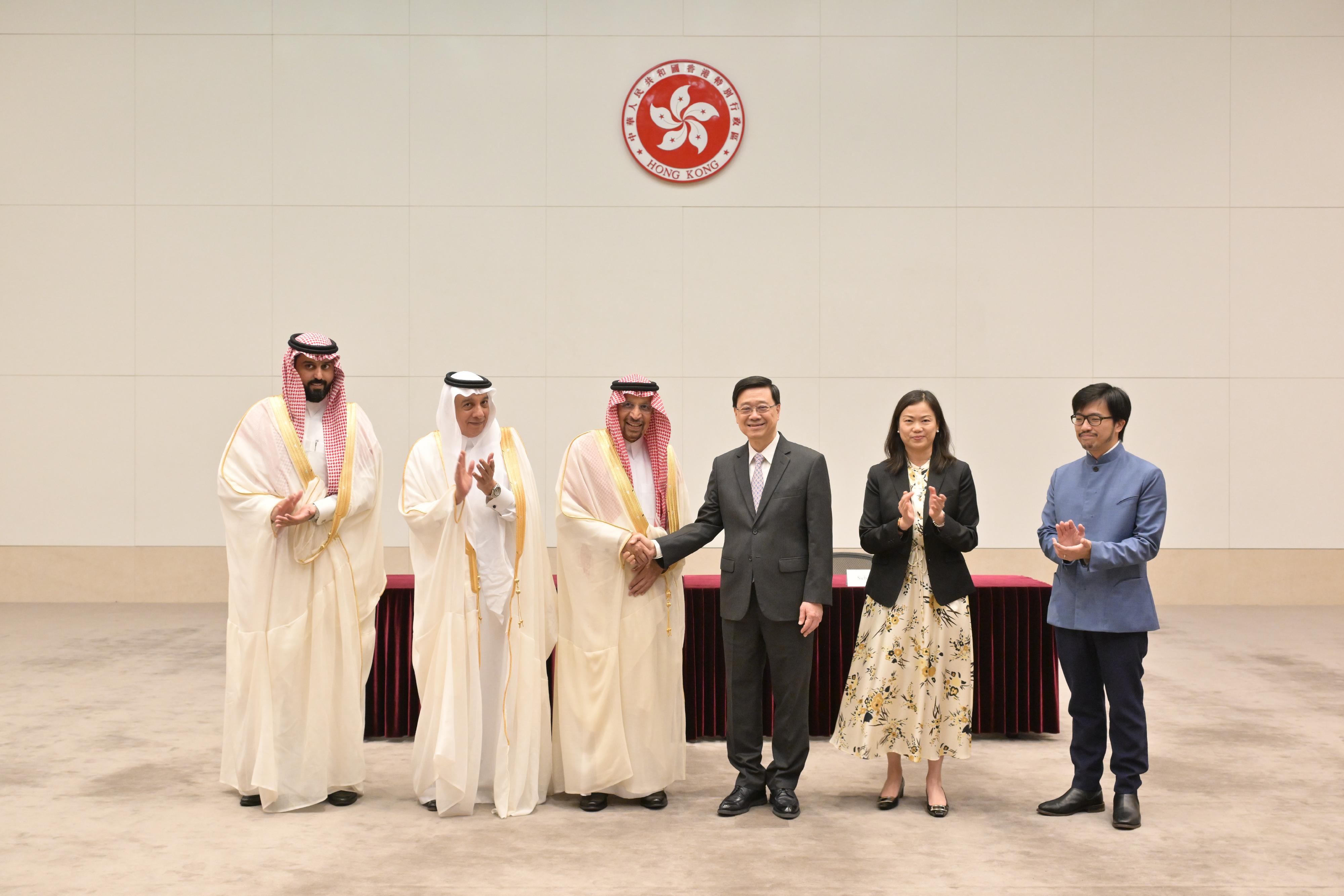The Belt and Road Office signed a Memorandum of Understanding (MOU) with the Ministry of Investment of Saudi Arabia (MISA) today (August 29) to enhance information exchange in relation to the fields of infrastructure and construction, and for MISA to provide support to related professional services in Hong Kong to access the Saudi Arabian market. Photo shows the Chief Executive, Mr John Lee (third right); the Minister of Investment of Saudi Arabia, Mr Khalid Al-Falih (third left); the Permanent Secretary for Commerce and Economic Development, Ms Maggie Wong (second right); the Consul General of Saudi Arabia in Hong Kong Mr Mazin Hamad Mohamad Alhimali (second left); the Commissioner for Belt and Road, Mr Nicholas Ho (first right); and the Assistant Deputy for Services Sectors of the MISA, Mr Fahad M. Alhashem (first left), at the signing ceremony.