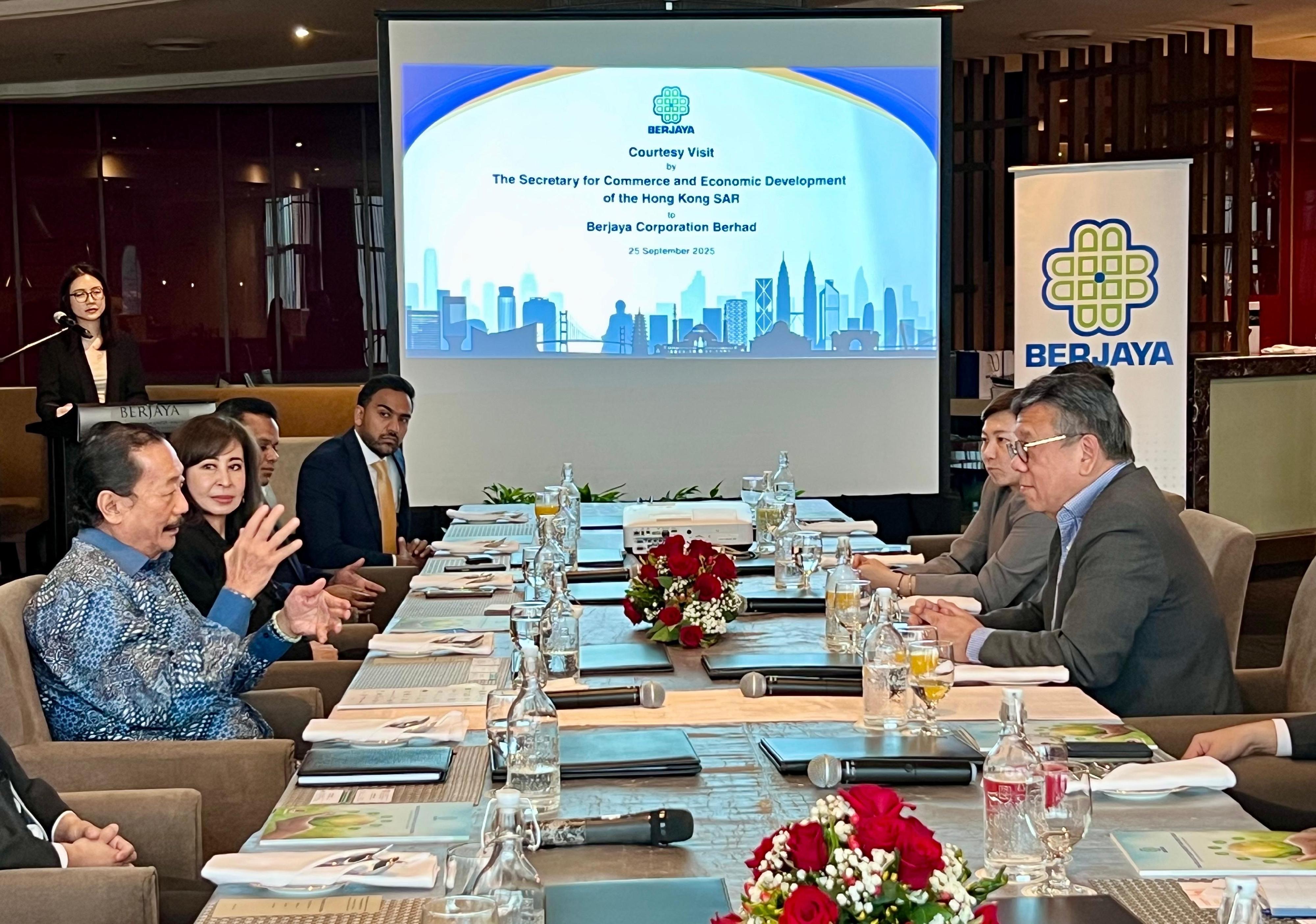 The Secretary for Commerce and Economic Development, Mr Algernon Yau, today (September 25) promoted Hong Kong's premier business environment and fostered further collaboration between Hong Kong and Malaysia to achieve mutual benefits on his visit to Kuala Lumpur, Malaysia. Photo shows Mr Yau (first right) visiting Berjaya Corporation Berhad, a major Malaysian conglomerate, and meeting with the founder of the group, Mr Vincent Tan (first left), to exchange views on deepening Hong Kong's partnership with the Malaysian business sector, leveraging the city's unique advantages under the "one country, two systems" principle.