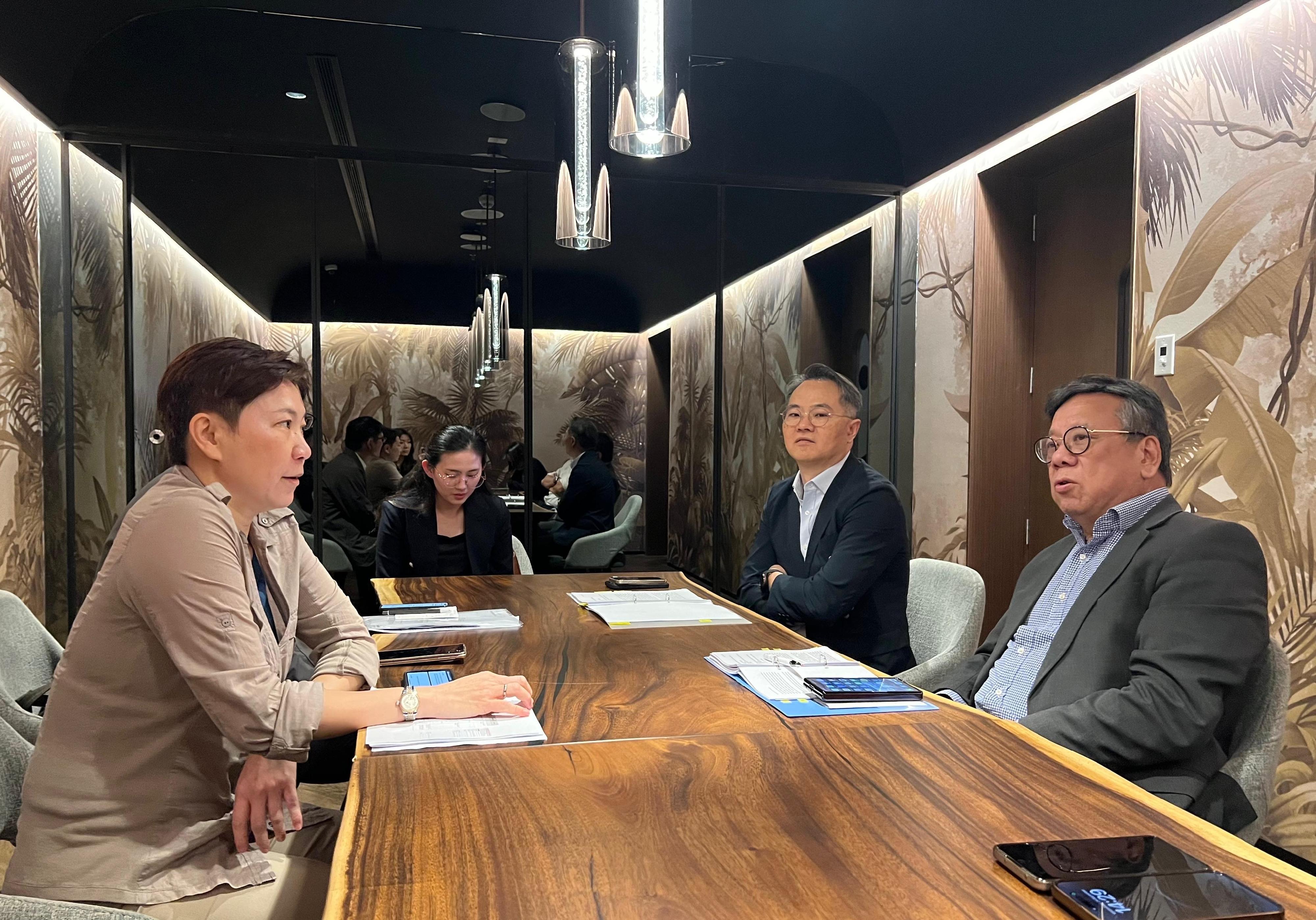 The Secretary for Commerce and Economic Development, Mr Algernon Yau, today (September 25) promoted Hong Kong's premier business environment and fostered further collaboration between Hong Kong and Malaysia to achieve mutual benefits on his visit to Kuala Lumpur, Malaysia. Photo shows Mr Yau (first right) yesterday (September 24) being briefed by the Director-General of the Hong Kong Economic and Trade Office (ETO) in Jakarta, Miss Libera Cheng (first left), on the progress of the establishment of an ETO in Kuala Lumpur. Also present was the Director-General of Trade and Industry, Mr Aaron Liu (second right).