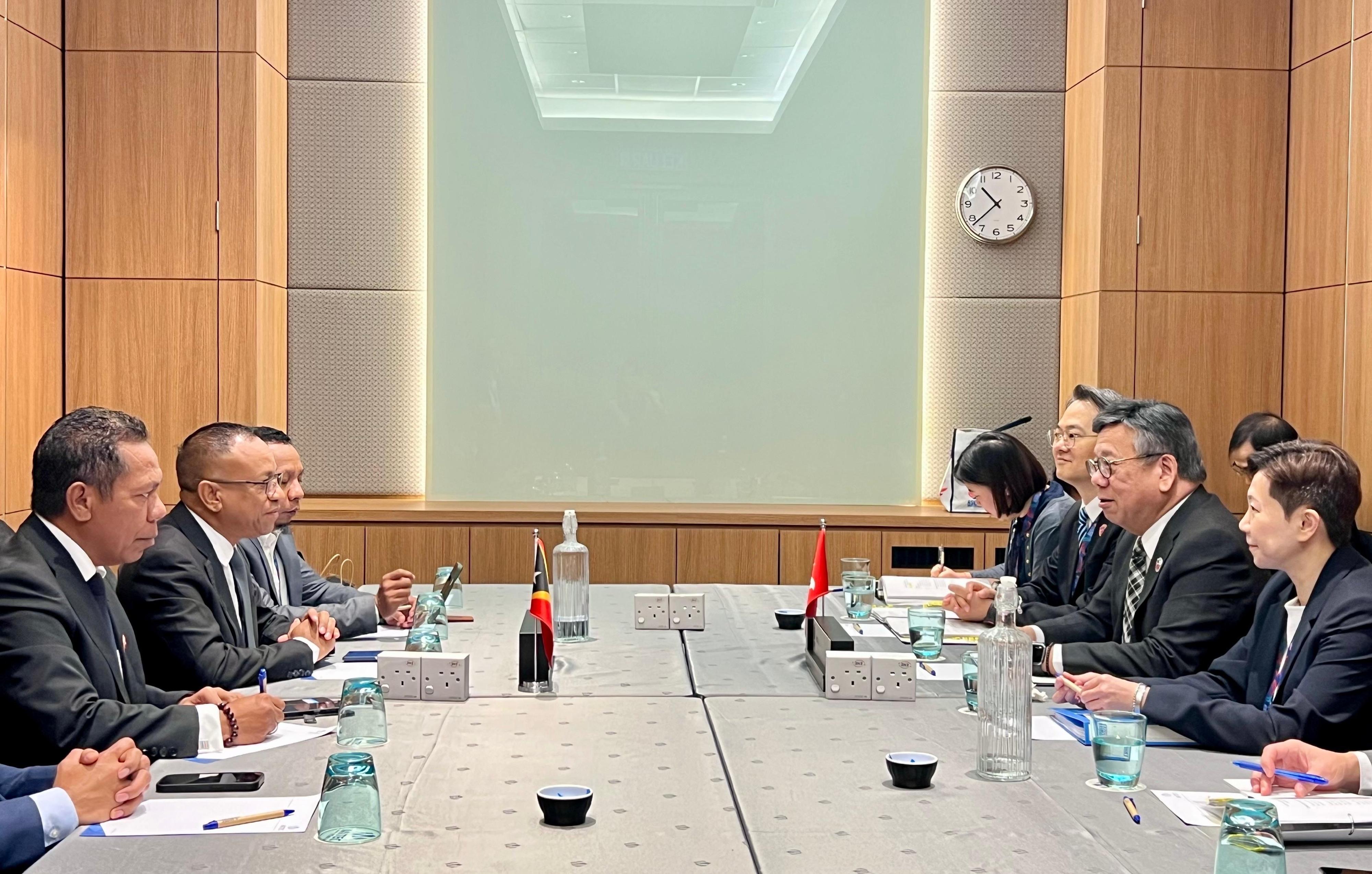 The Secretary for Commerce and Economic Development, Mr Algernon Yau (second right), holds a bilateral meeting with the Minister of Commerce and Industry of Timor-Leste, Mr Filipus Nino Pereira (second left), to exchange views on issues of mutual interest on the sidelines of the 9th Association of Southeast Asian Nations Economic Ministers - Hong Kong, China Consultation in Kuala Lumpur, Malaysia, today (September 26). The Director-General of Trade and Industry, Mr Aaron Liu (third right), and the Director-General of the Hong Kong Economic and Trade Office in Jakarta, Miss Libera Cheng (first right), also attended.
