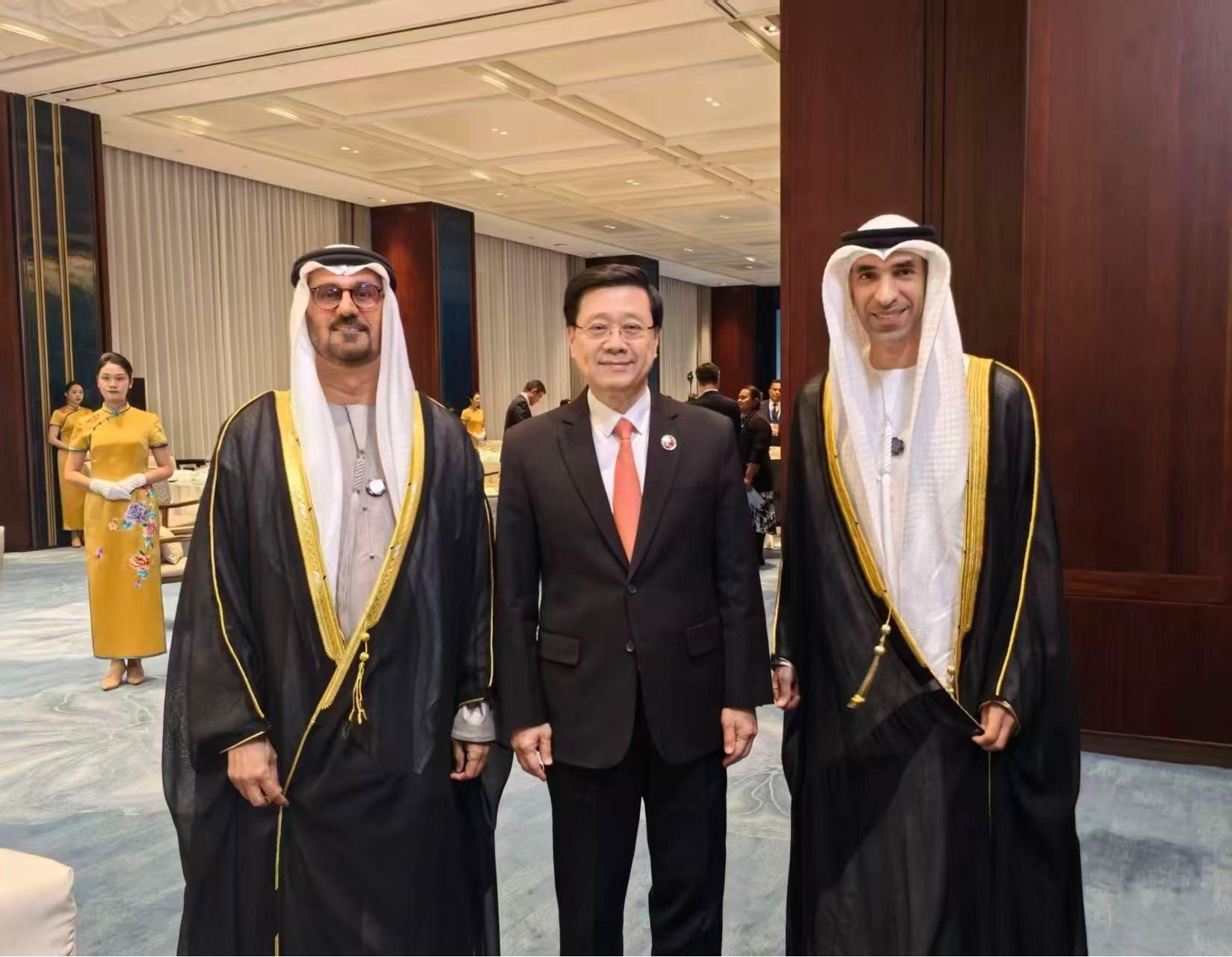 The Chief Executive, Mr John Lee, attended the welcome dinner for the eighth China International Import Expo on November 4. Photo shows (from left) the Deputy Chairman of the Presidential Court for Development and Fallen Heroes' Affairs, the United Arab Emirates (UAE), Sheikh Theyab bin Mohamed bin Zayed Al Nahyan; Mr Lee, and the Minister of State for Foreign Trade of the UAE, Dr Thani bin Ahmed Al Zeyoudi at the event.